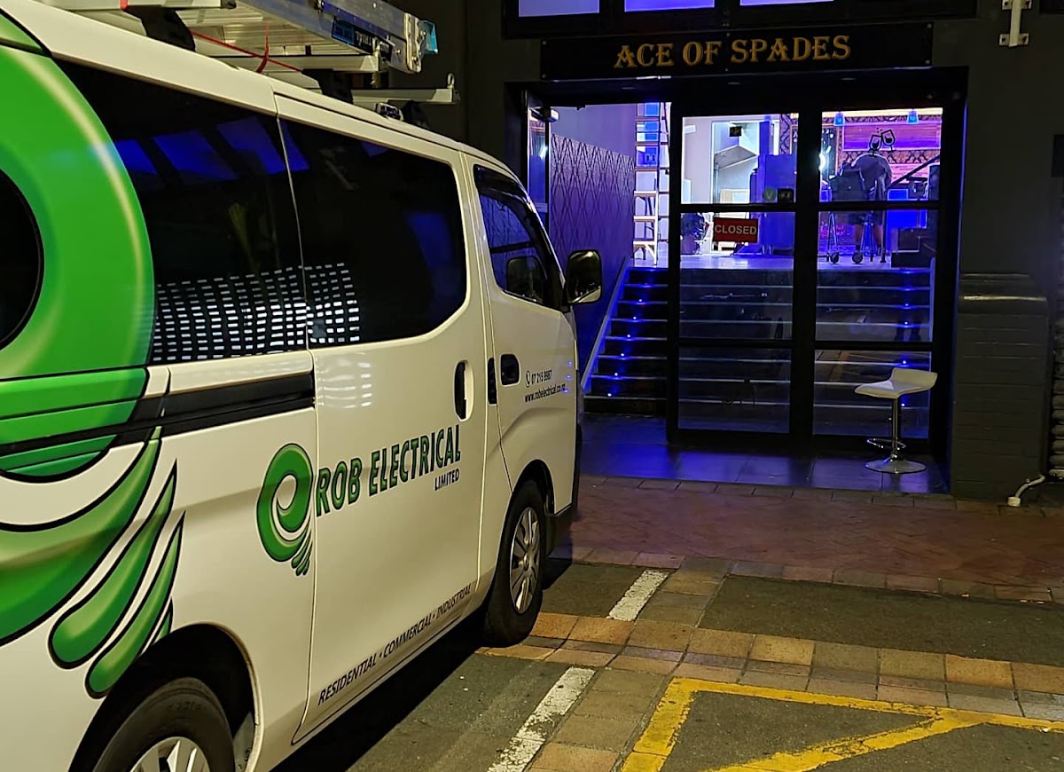 Rob Tiatia Electrical van outside a commercial venue at night
