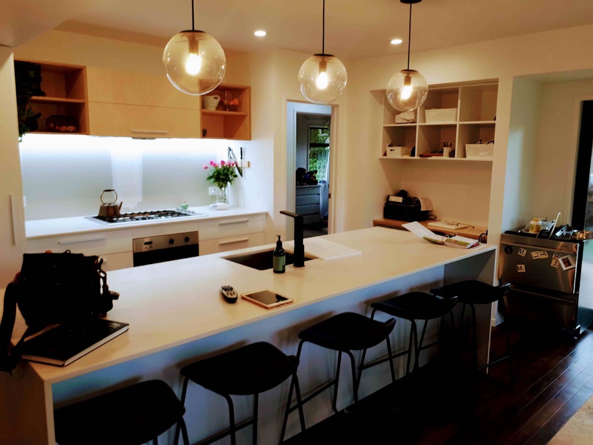 Modern kitchen with glass pendant lighting